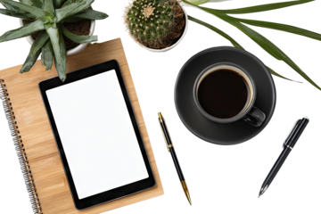 Flat lay of workspace with tablet, plants, coffee