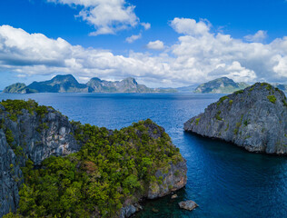 Island hopping at El Nido, Palawan, Philippines archipelago. Tour A, B, C, D with traditional Filipino boats. Aerial drone view