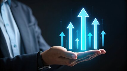 Businessman holding glowing blue arrows indicating growth and success