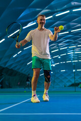 Man playing tennis on a court