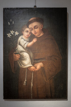 Oil painting of Saint Anthony of Padua, a Franciscan monk.
