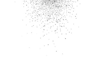 Fine white sugar crystals falling against a stark black background