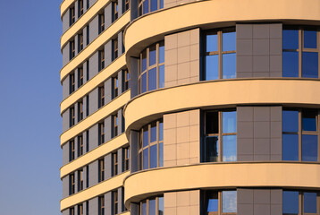 Cityscape on a summer day, modern buildings and houses 