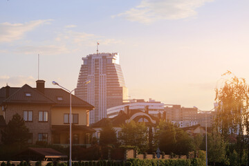 City view, modern buildings and skyscrapers against the blue sky.
