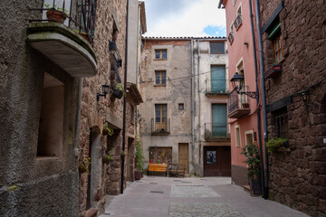 Fototapeta premium Prades, a picturesque village in Baix Camp, Tarragona, Catalonia, known as the Red Town for its distinctive reddish sandstone buildings.
