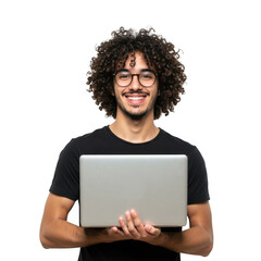 A smiling young man with curly hair and glasses holds a silver laptop computer presenting it forward isolated on transparent background