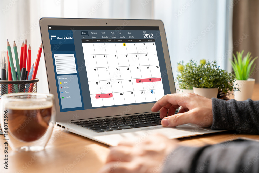 Wall mural calendar on computer software application for modish schedule planning for personal organizer and on