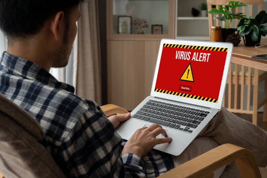 Virus warning alert on computer screen detected modish cyber threat , hacker, computer virus and malware