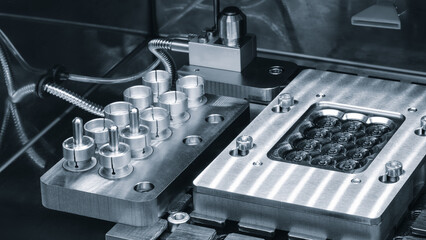 Metalworking machine with finished round parts, industrial concept