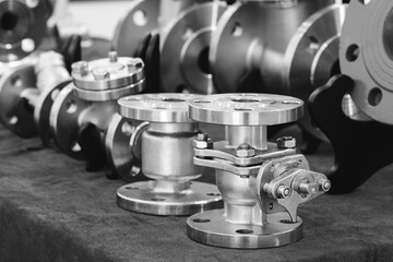 Steel water pipe with a plate on top for bolting. The plate is made of metal and has a hole in the middle. Engineering fittings Industrial concept
