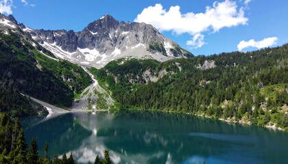 Fototapeta premium Picturesque mountain lake nestled in a valley.