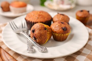 Tea time Banana cup cake with fork in white plate