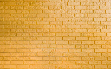 Obraz premium Yellow Brick Wall with Texture and Soft Light for Design