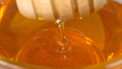 Golden liquid wax pouring