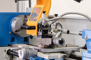 Control disk of metalworking machine with applied measuring ruler and control handle. metalworking industrial machines concept