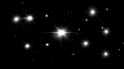Fototapeta premium Bright stars illuminate the dark night sky, creating a stunning view for stargazers in a quiet rural setting on a clear evening. The twinkling lights evoke a sense of wonder and tranquility.