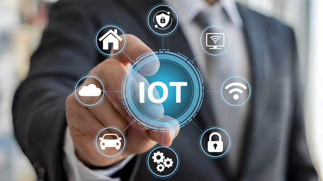 Modern business leader activating IOT interface for a smart connected future, showcasing innovative solutions for home, car, cloud and security in a digital world