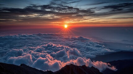 Sunrise over a mountain range, cloudscape
