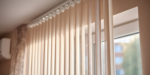 Fototapeta premium Detail of closed beige vertical blinds in a bedroom interior , blinds, window, interior design, home decor, privacy
