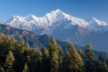 Fototapeta premium breathtaking summer landscape featuring majestic snowcapped mountains under clear blue sky