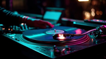 Dj operating turntable neon lighting