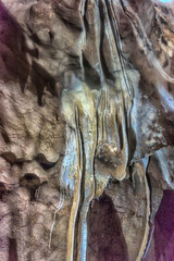 Close-up of the interior formations in a cave with dripstone structures created by thousands of...