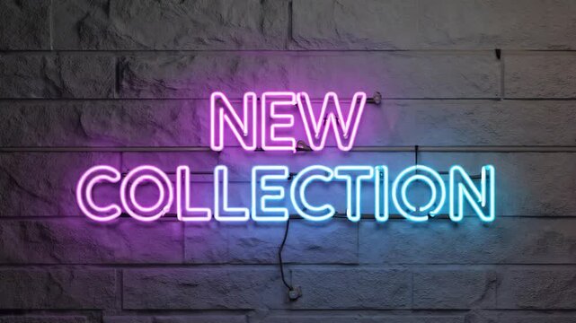 Neon sign glowing on a gray brick wall announces the arrival of a new collection, radiating excitement for fresh designs and the latest fashion trends in retail