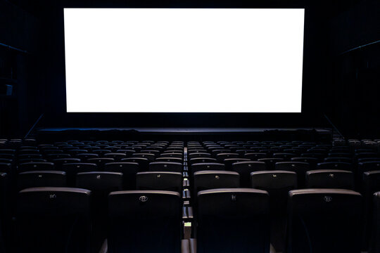 Cinema with black chairs with white blank screen in Brazil. Mockup of hall, no people and auditorium