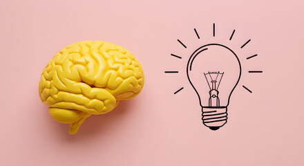 Yellow brain on pink background, concept light bulb idea with pencil drawing. Space for text.