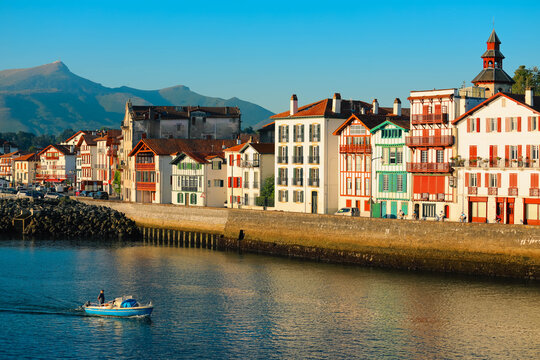 Traditional half-timbered basque houses in port of Saint Jean de Luz, Nouvelle-Aquitaine, France