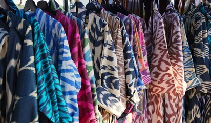 Designer clothes made of traditional silk Uzbek fabric ikat adras