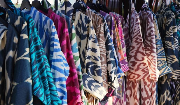 Designer clothes made of traditional silk Uzbek fabric ikat adras