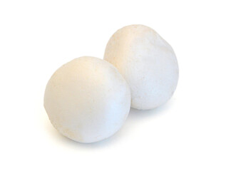 A sections of mushroom in bowl on white