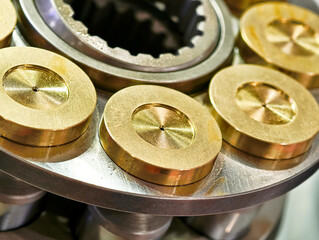 Hydraulic motor pistons showcasing precision engineering and metal components in a close-up view