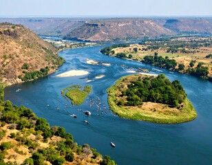 Obraz premium Zambezi River's Majestic Flow: Aerial Vista of Islands and Tranquil Waterscape