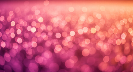 Abstract bokeh background with vibrant pink and orange tones.