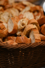 fresh bread assortment with melted cheese fondue, bakery display with cheese wheel, artisan bread and cheese platter,bread with sesame seeds, assorted breads, bread display
