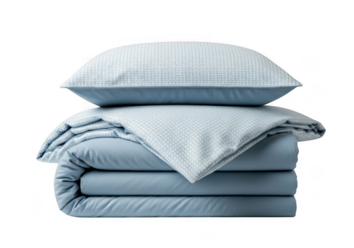 Neatly folded light blue bedding set with a white pillow on top isolated on transparent background