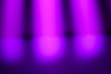 Dramatic stage background with bright pink spotlights from above casting circular light on a purple floor. Energetic and vibrant show concept.
