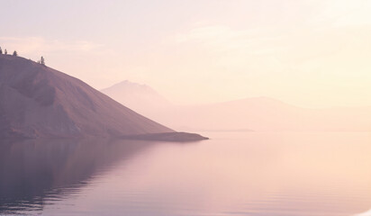 Obraz premium A large body of water with mountains in the background.