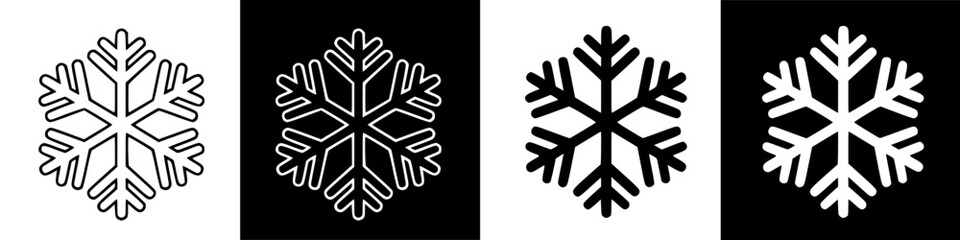 Obraz premium Four stylized snowflakes in contrasting black and white arrangements, showcasing symmetry.