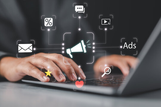 Digital marketing strategy. Announce promotions and campaigns via email and social media. Man using laptop computer to manage targeted advertising.