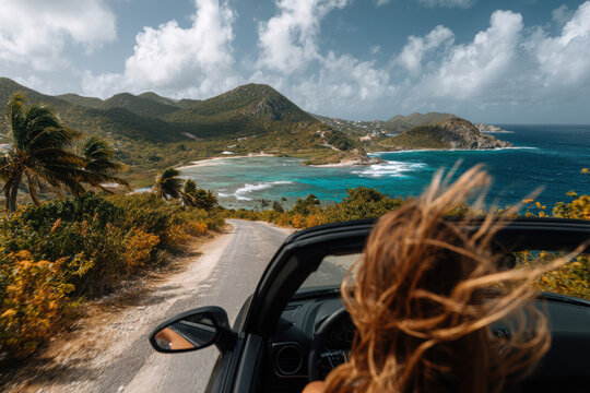 Coastal drive in a convertible with wind-swept hair