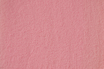 Fototapeta premium Textured Surface in Soft Pink Shade Creates a Calming Backdrop for Artistic Projects and Interior Design