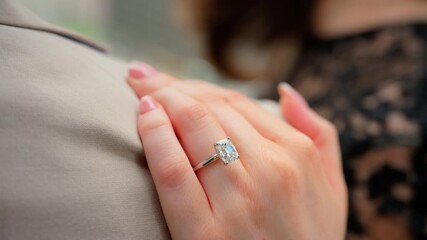 Marriage proposal. wedding ring on finger, enjoying surprise engagement