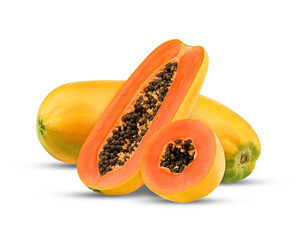 fresh papaya fruit, sliced and whole, on black