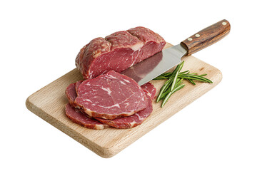 Fototapeta premium Freshly sliced meat on a wooden cutting board with a knife and herbs, showcasing quality and preparation for cooking.