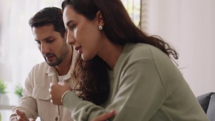 Married couple in emotional conflict and argument at home, fighting through relationship problems and difficult divorce discussions - Powered by Adobe