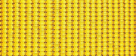 Fototapeta premium Intricate woven texture in vibrant sunny yellow, mustard, close-up