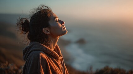 A serene moment of reflection at sunset, capturing the beauty of nature and inner peace by the ocean.